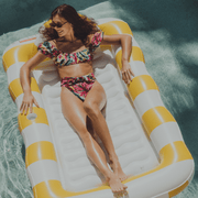 2-in-1 Tanning Pool Lounger Collection. Use in or out of the water. Yellow and White